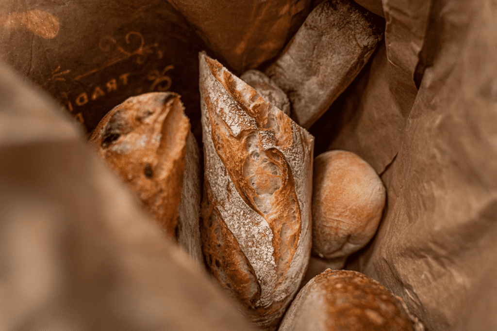 bag of french bread, farm-to-table Christmas dinner, supporting local farmers during Christmas, seasonal winter produce for Christmas